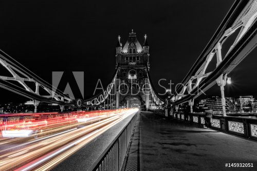Tower Bridge in London in black and white, UK at night with blur colored car ... - 901152830