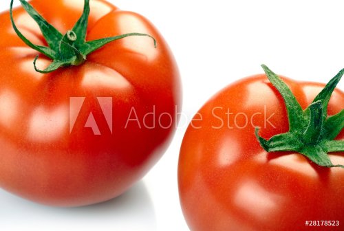 Two tomatoes isolated on white background - 900673704
