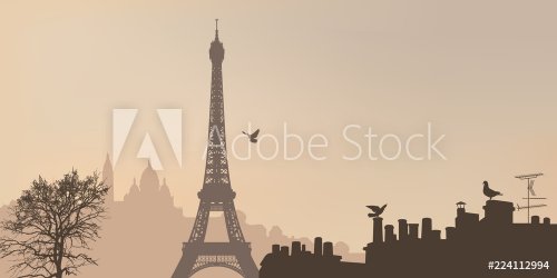 Vue de Paris avec la tour Eiffel et la butte de Montmartre avec le Sacré-Cœur, un jour de brume.