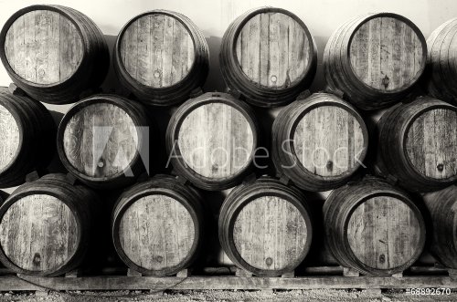 Whisky or wine barrels in black and white - 901154547
