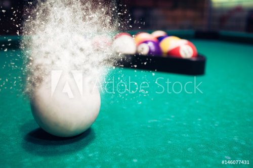 White billiard ball breaks up into particles and debris