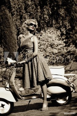 Woman in retro dress with a scooter - 901137960