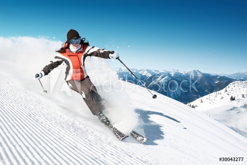 Woman skiing in high mountains - modified piste - 900076780