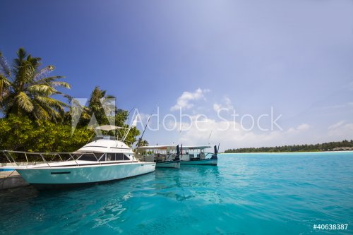 yacht in front of an island