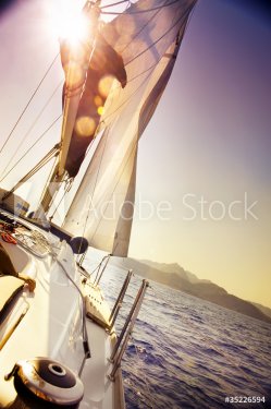 Yacht Sailing against sunset.Sailboat.Sepia toned - 900464308