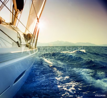 Yacht Sailing against sunset.Sailboat.Sepia toned - 900464321