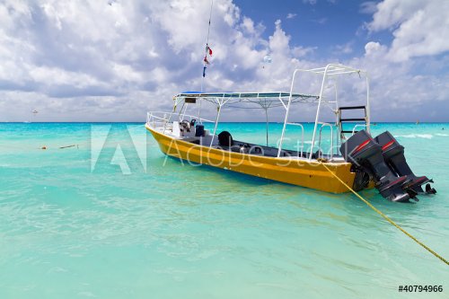 Yellow boat on the coast of Caribbean Sea - Mexico