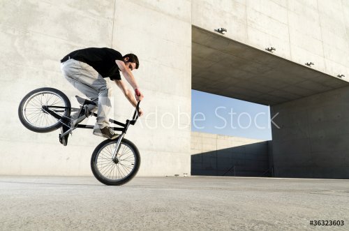 Young BMX bicycle rider - 900199418