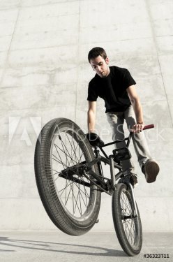 Young BMX bicycle rider - 900204229