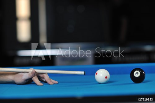 young man play pro billiard game - 901142080