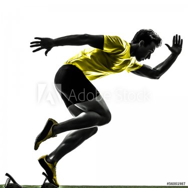 young man sprinter runner in starting blocks silhouette