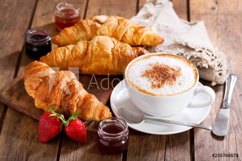 Breakfast with cup of cappuccino coffee with croissants - 901152556