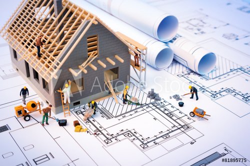 building house on blueprints with worker - construction project - 901152724