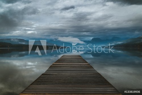 Lake dock on an overcast day. - 901149358