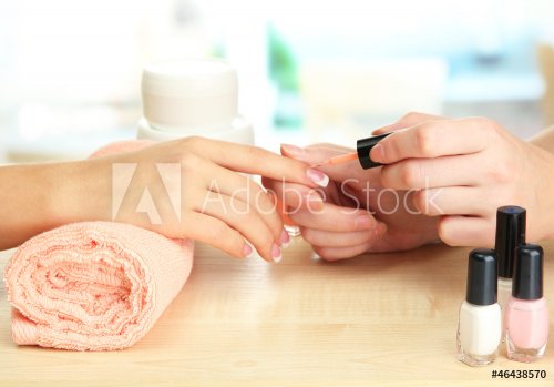 Manicure process in beauty salon, close up - 900881460