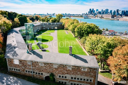 Old Montreal military fort with  St-Laurence river and downtown on background at autumn