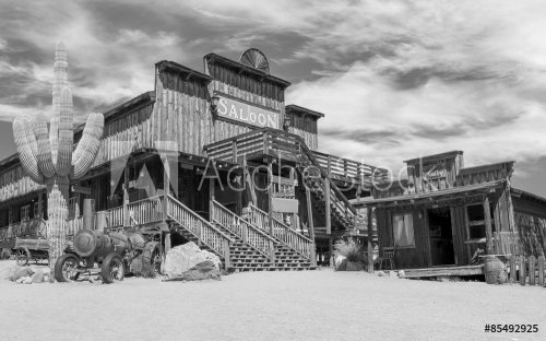 Old Wild West desert cowboy town with cactus and saloon in Black and White - 901147174