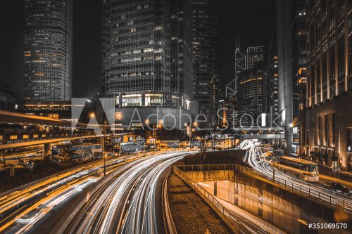 Busy traffic and urban landscape at night in Hong Kong - 901156411