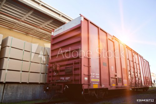 Industrial railway carriage transporting Lumber by rail - 901156334