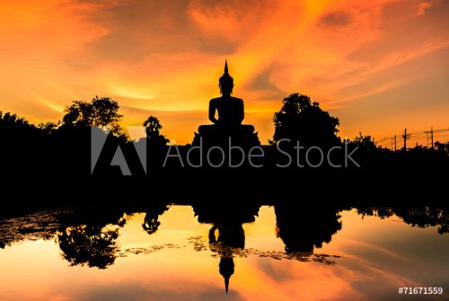 silhouette big buddha statue sitting reflection on the water - 901156559