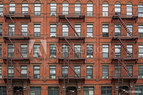 New York City, old,apartment building with external fire escape - 901156963