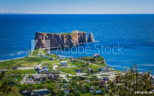 View on the Percé rock, the ocean, the cape Mont Joli, and the Percé Village from the Unesco Geopark and their Belvedere hiking trail