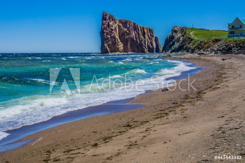 View on Percé Rock and Cape Mont Joli from the North cove beach in Gaspesie (Quebec, Canada)