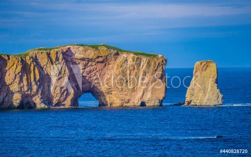View at end of the afternoon on Percé Rock from the small town of Percé in Quebec (Canada)