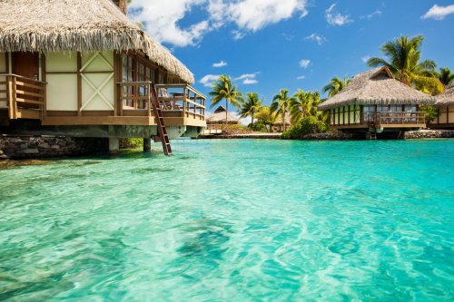 Over water bungalows with steps into amazing lagoon