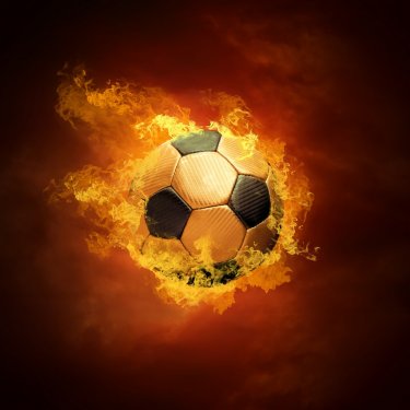 Hot soccer ball on the speed in fires flame - 900060476