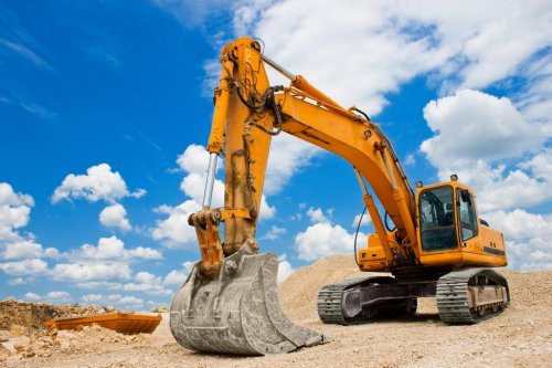 Yellow Excavator at Construction Site - 900060514