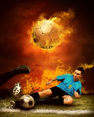 Football player in fires flame on the outdoors field - 900321595