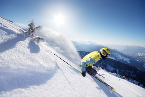 Skier in mountains - 900328759