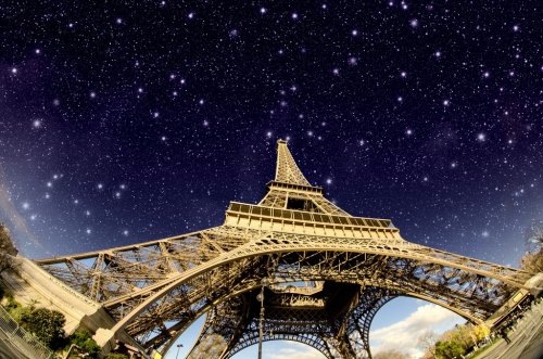 Stars and Night Sky above Eiffel Tower in Paris - 900420197