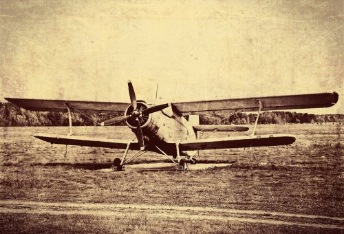 Vintage photo of an old biplane - 900464311