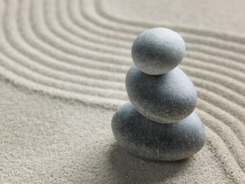 Zen stone in the sand - 900634958