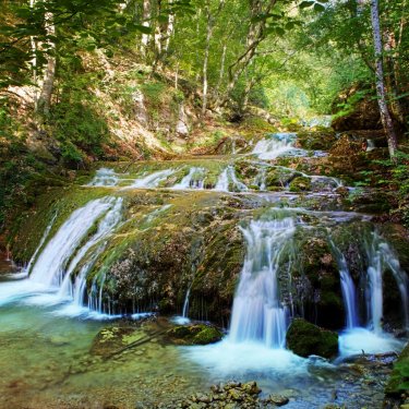 The beautiful waterfall in forest, spring, long exposure - 900636549