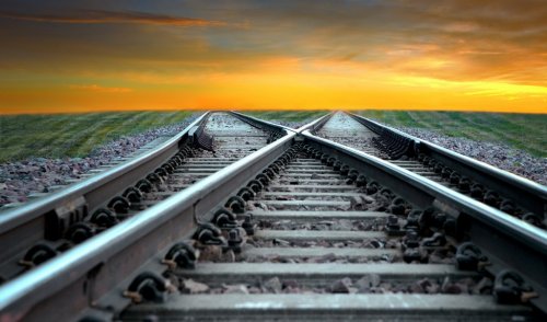 Railroad in sunset - 901138162