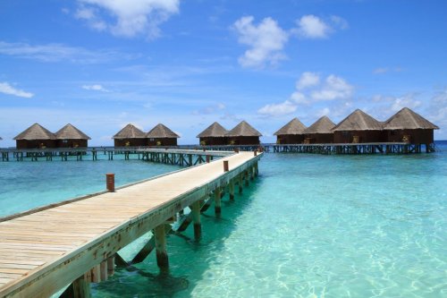 Long wooden bridge and water villas,Maldives - 901140018