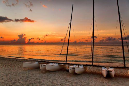 catamarans on Varadero's beach at sunset, Cuba - 901140432