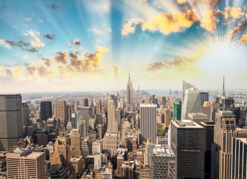 Stunning sunset in New York. Aerial view of Manhattan skyline an
