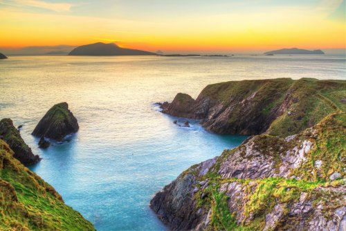 Sunset over Dunquin bay on Dingle Peninsula, Co.Kerry, Ireland - 901140667
