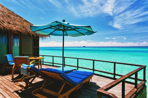 Overwater villa balcony overlooking tropical lagoon - 901141094