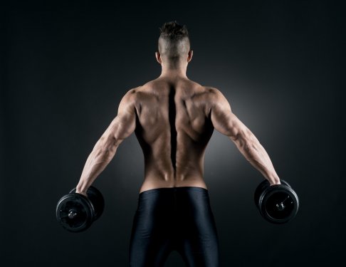 Muscular man weightlifting