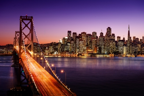 San Francisco skyline and Bay Bridge at sunset, California - 901142424
