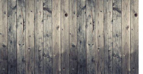 Real seasoned wooden background.