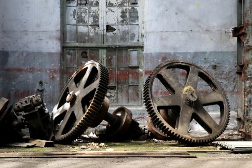 rusty old metal gadgets in an abandoned ship factory - 901143992