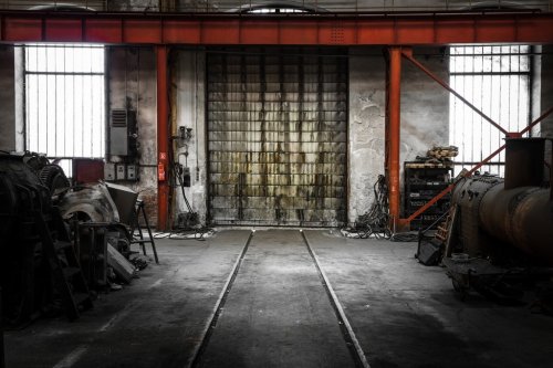 old metal gate in vehicle repair station - 901144040
