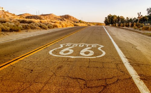Historic Route 66 with Pavement Sign in California - 901147238