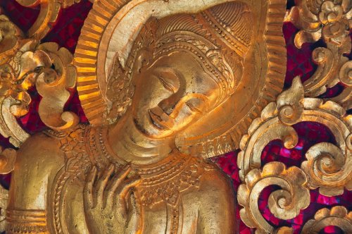 Bas-relief of golden buddha with traditional buddhism pattern - 901147574